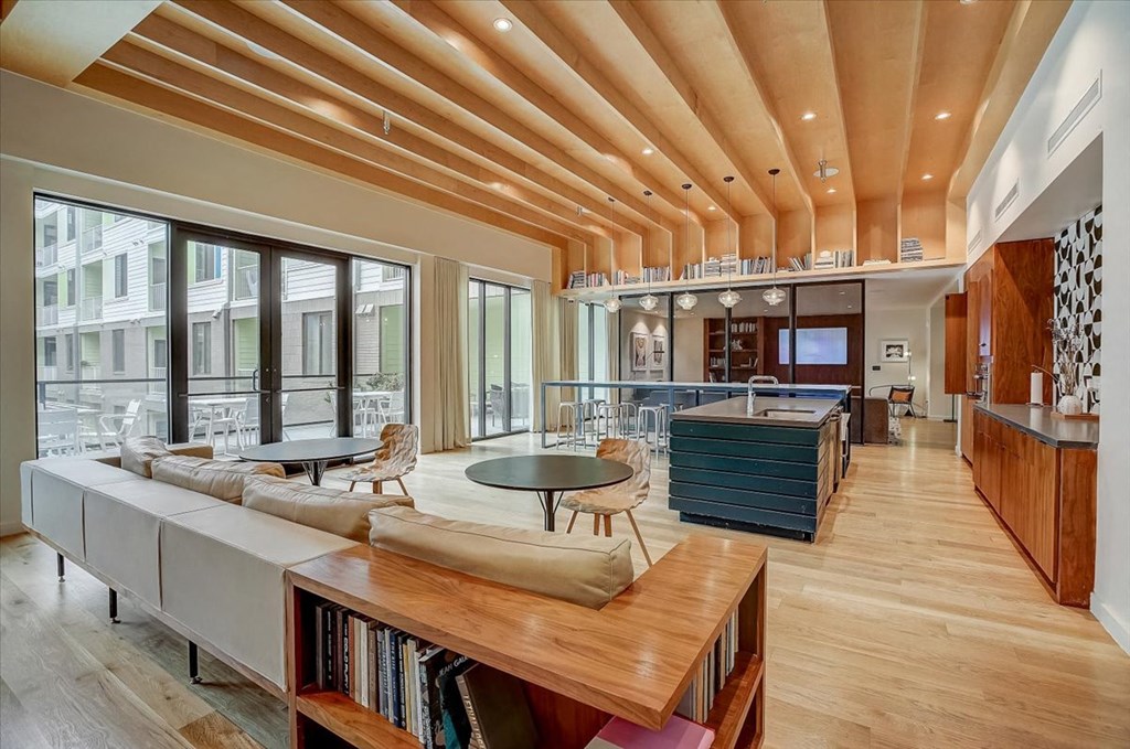 a living room with a couch and a table