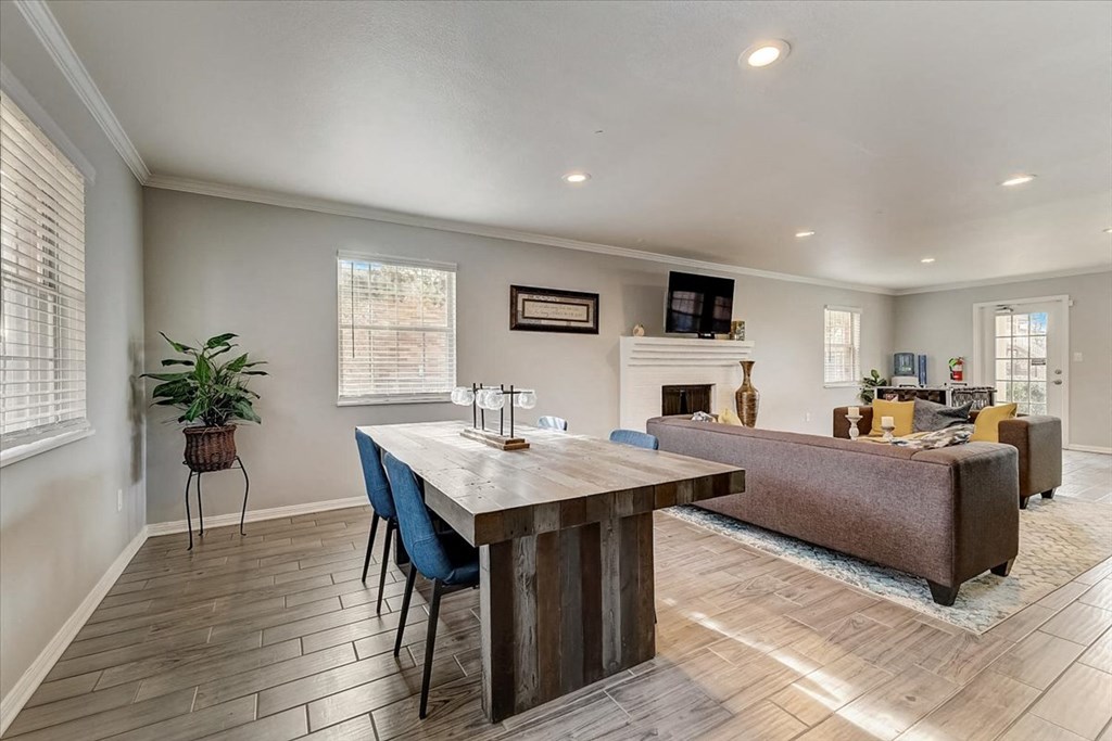 a living room with a table and a couch