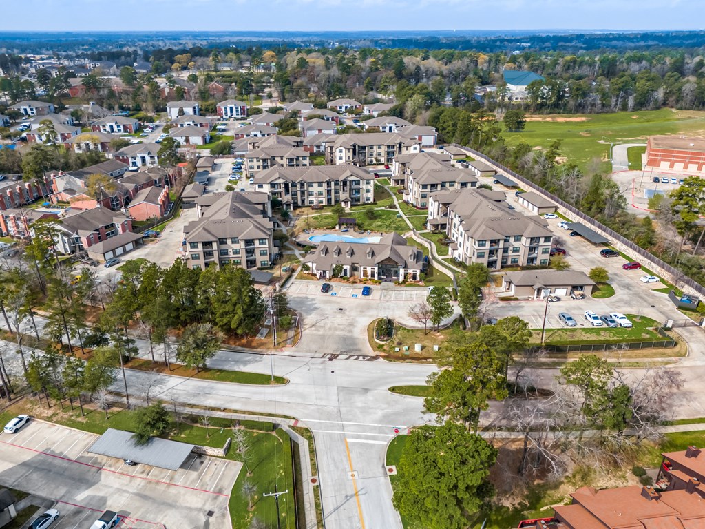 an aerial view of a neighborhood of houses in a city