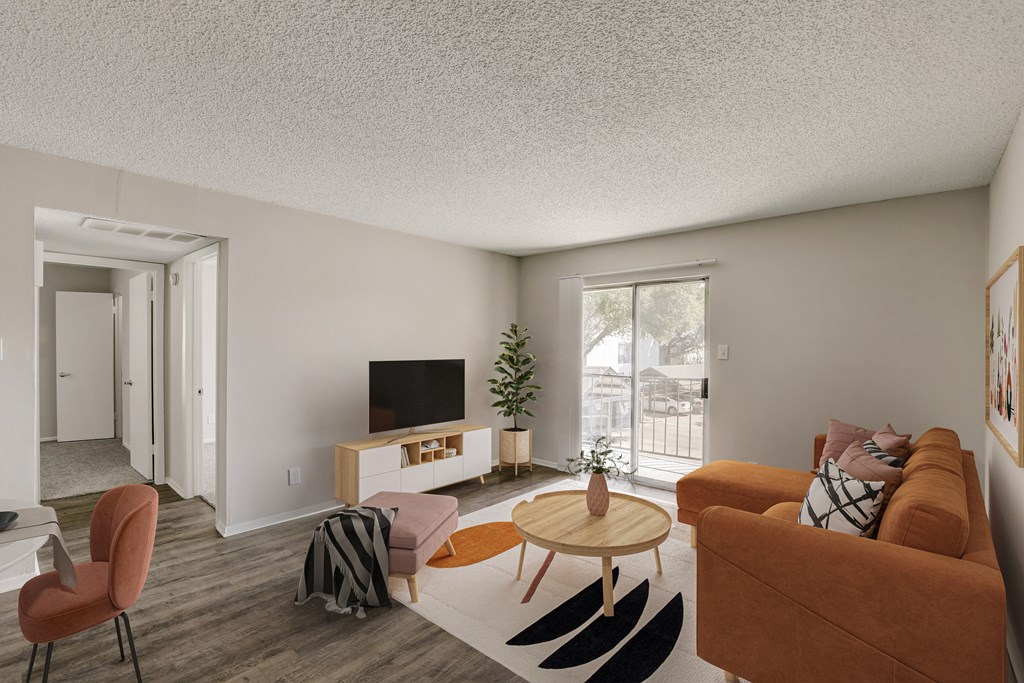 a living room with a couch and a table