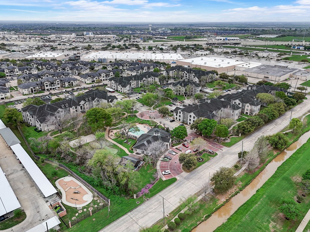 an aerial view of a neighborhood of houses in a city