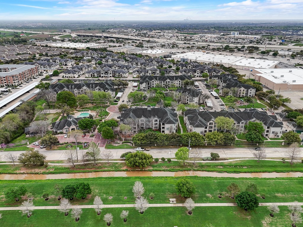 an aerial view of a neighborhood with houses and trees