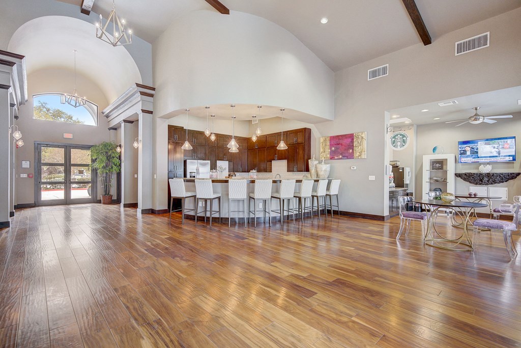 the preserve at ballantyne commons community room with bar and dining area