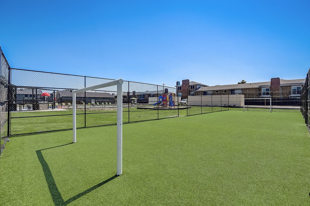 our apartments showcase a sprinkler system for watering the grass