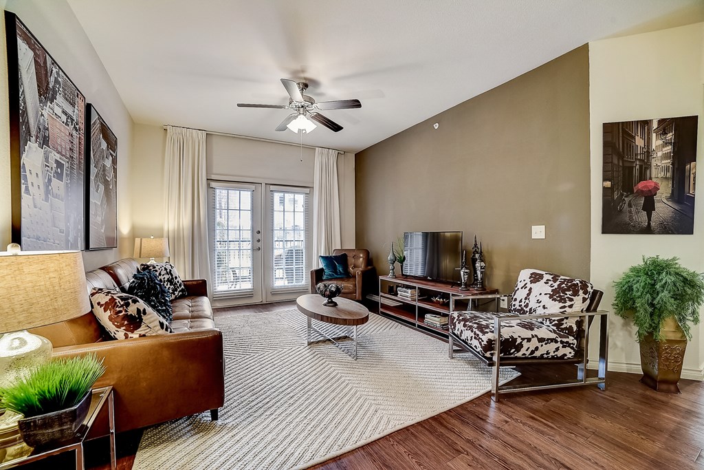 a living room with a couch and a chair