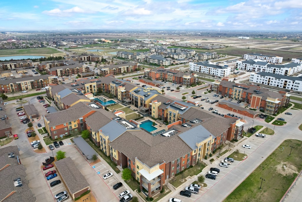 an aerial view of a housing development in a city