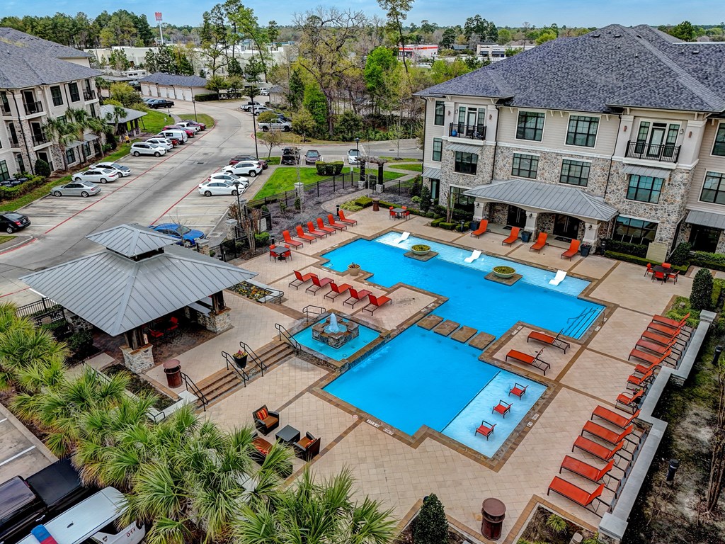 an aerial view of the resort style pool at the estates at spring valley