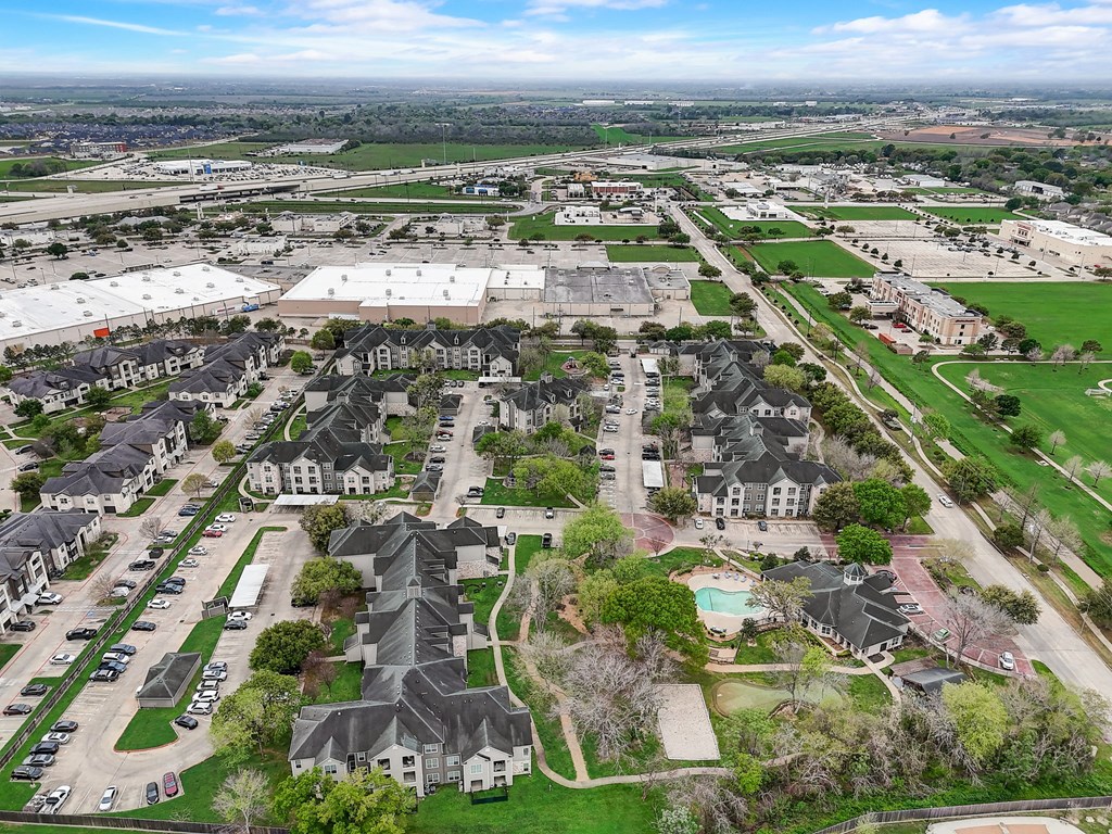 an aerial view of a neighborhood with houses and lawns