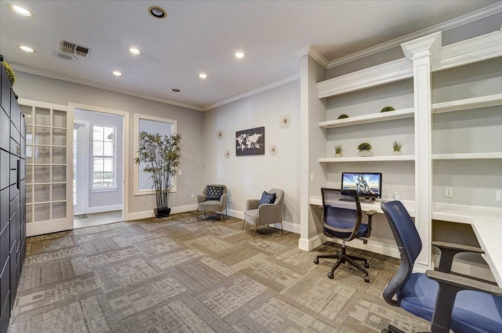 a home office with a desk and a computer