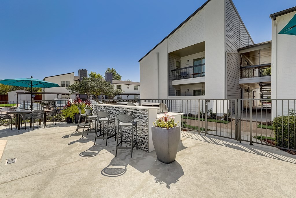 the reserve at bucklin hill patio with tables and chairs and umbrellas