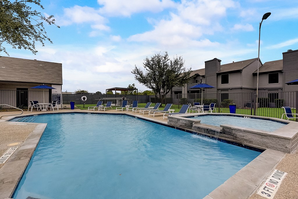 the preserve at ballantyne commons pool and spa with apartment buildings