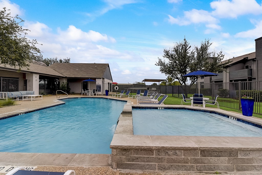 the preserve at ballantyne commons pool and spa with apartment buildings