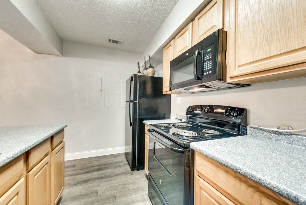 the kitchen of our studio apartment estates