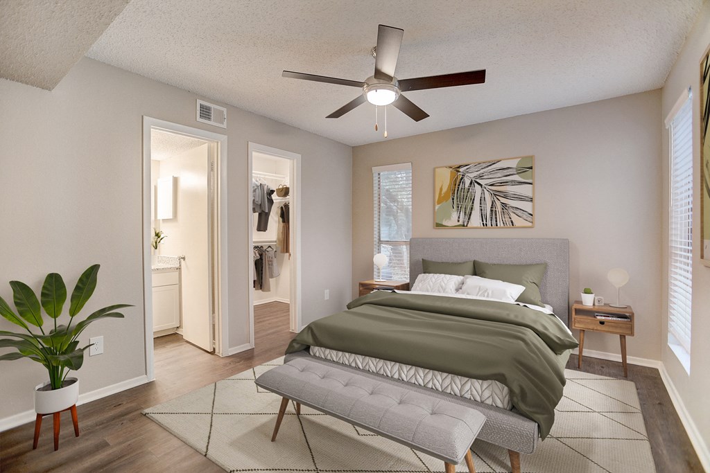 create a room with a bed and a ceiling fan