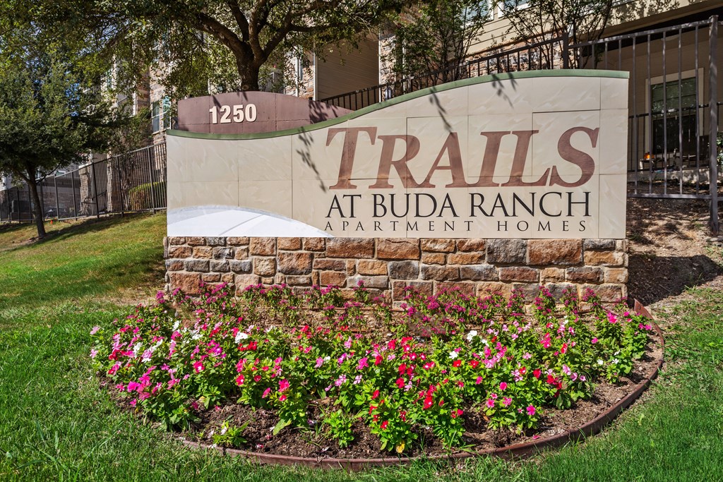 a sign that says trails at bula ranch apartments