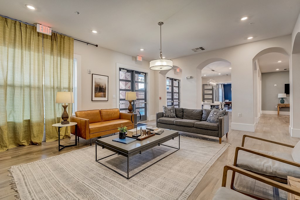 a living room with couches and a coffee table