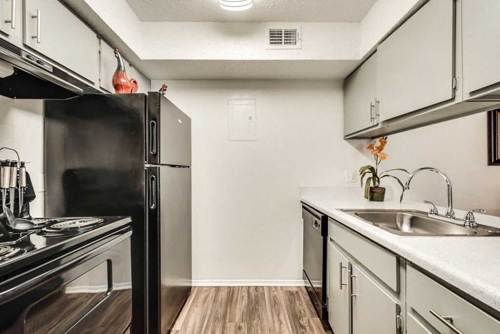 the preserve at ballantyne commons apartment kitchen with stainless steel appliances