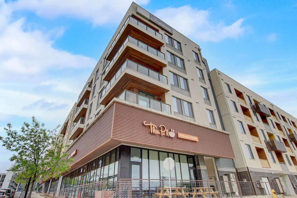 a large building with a sign on the side of it