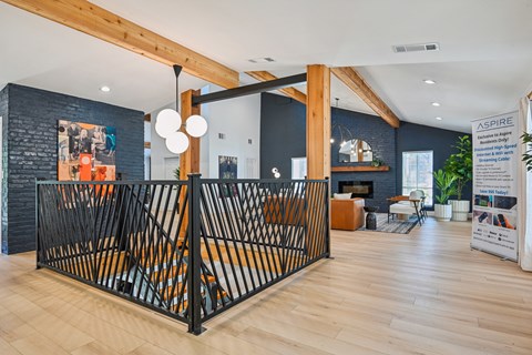 A large open space with a black gate in the middle.