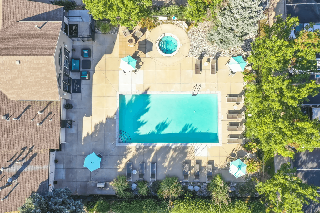 a birds eye view of the pool at the resort at longboat key club