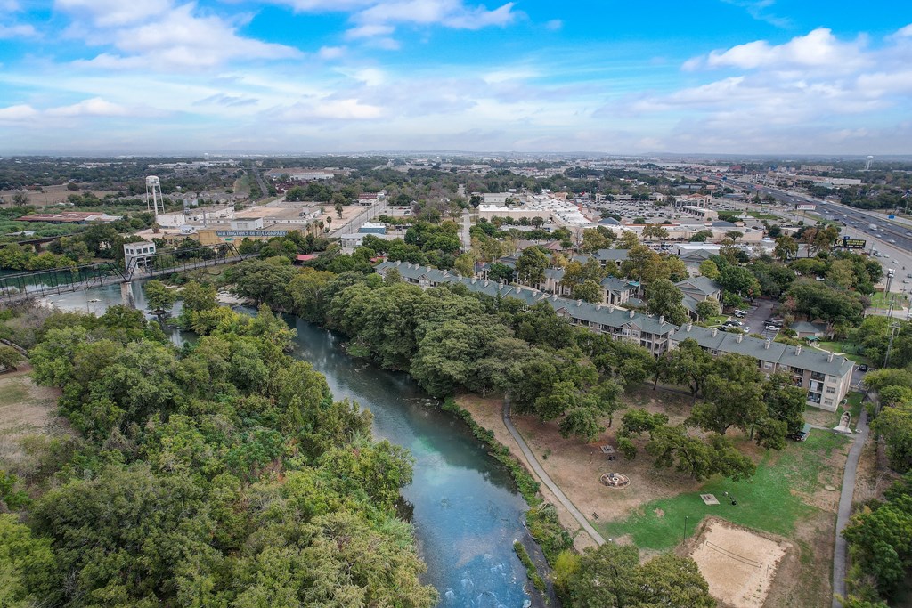 an aerial view of the river and the city
