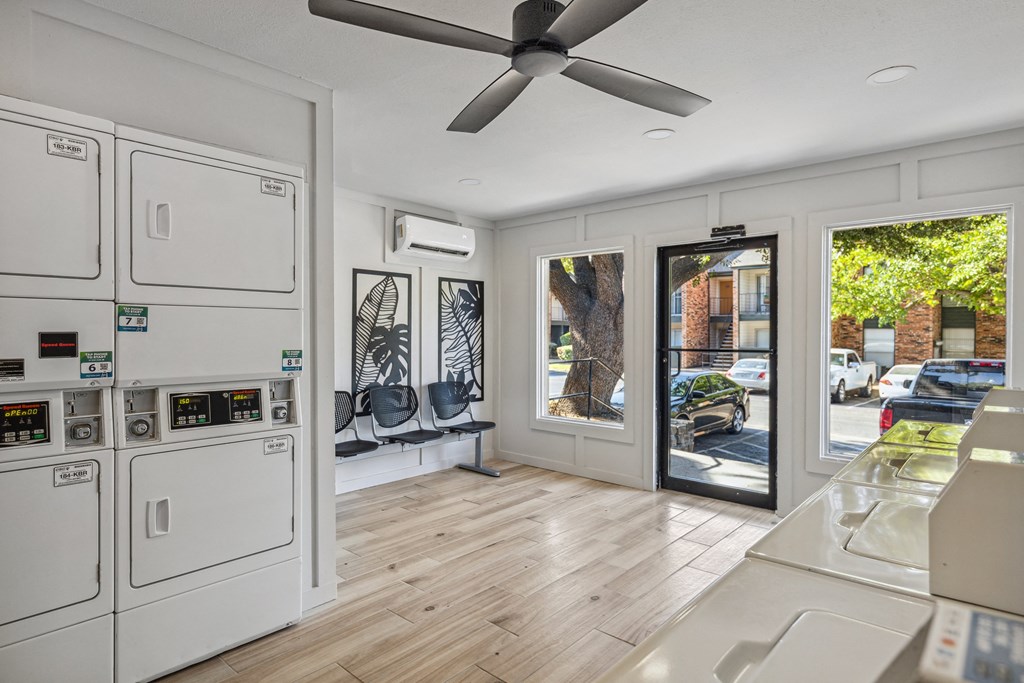a laundry room with a washer and dryer