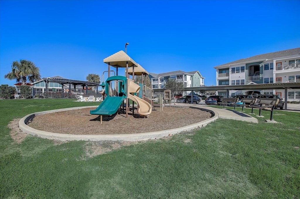 the preserve at ballantyne commons playground with a slide