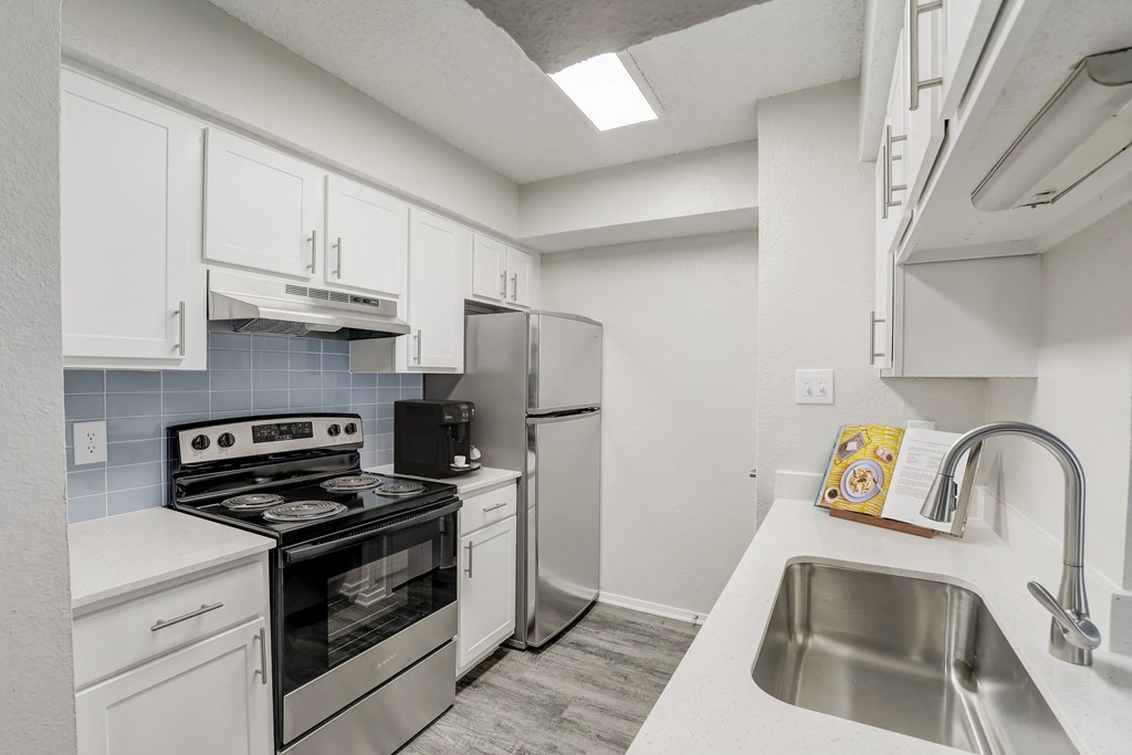 the preserve at ballantyne commons apartment kitchen with stainless steel appliances