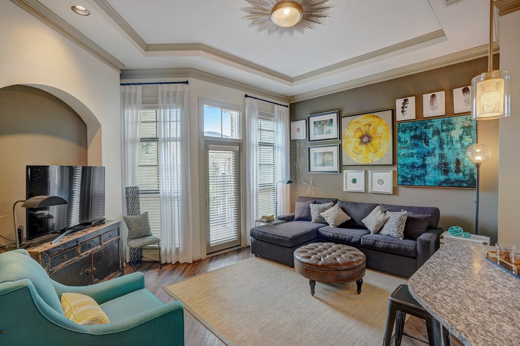 a living room with a couch and a tv