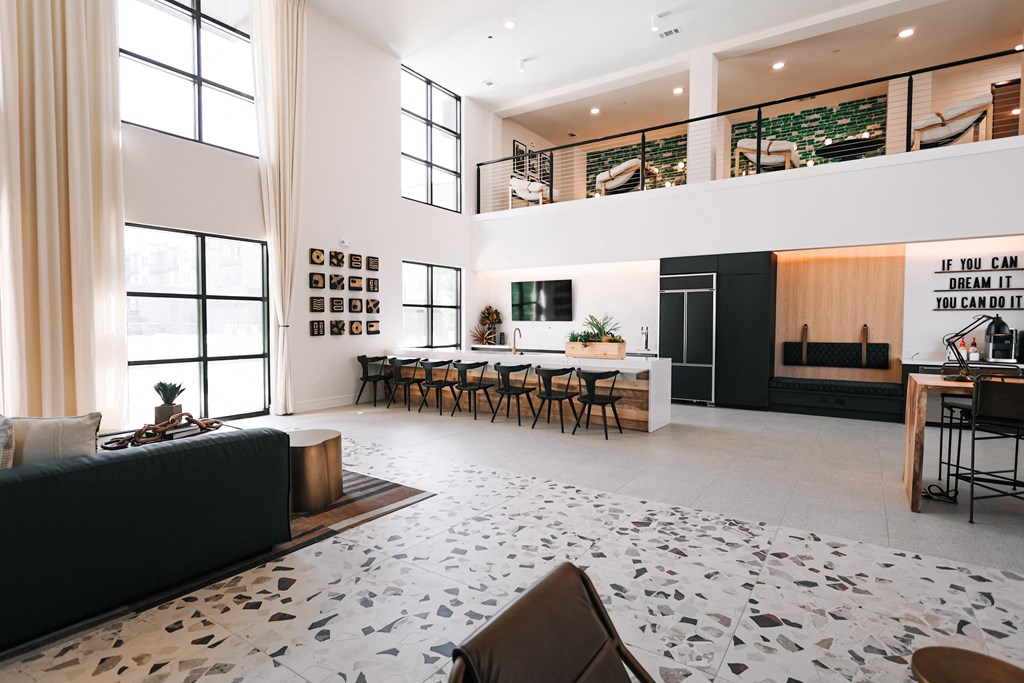 a large living room with a dining room and a kitchen