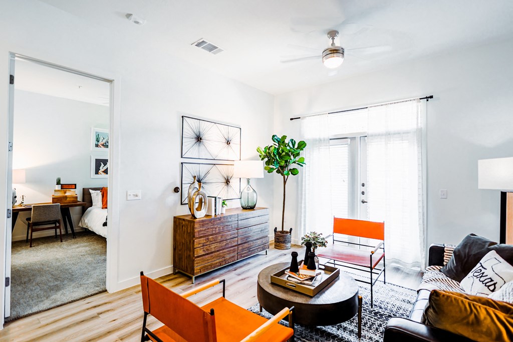 a living room with a couch and a table