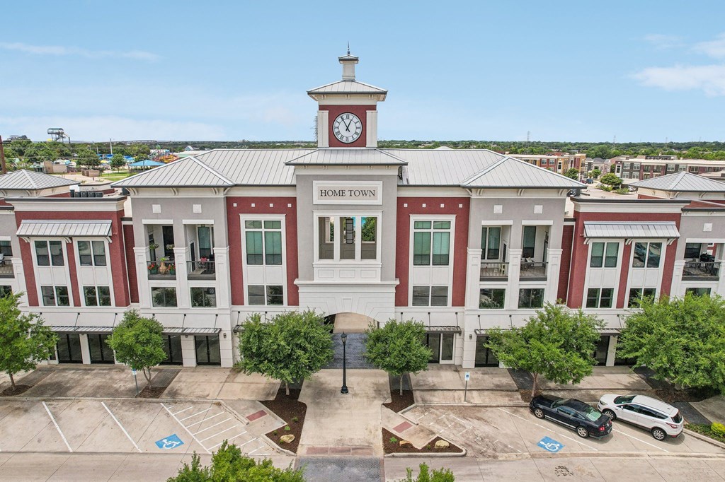 an aerial view of a building with a clock tower