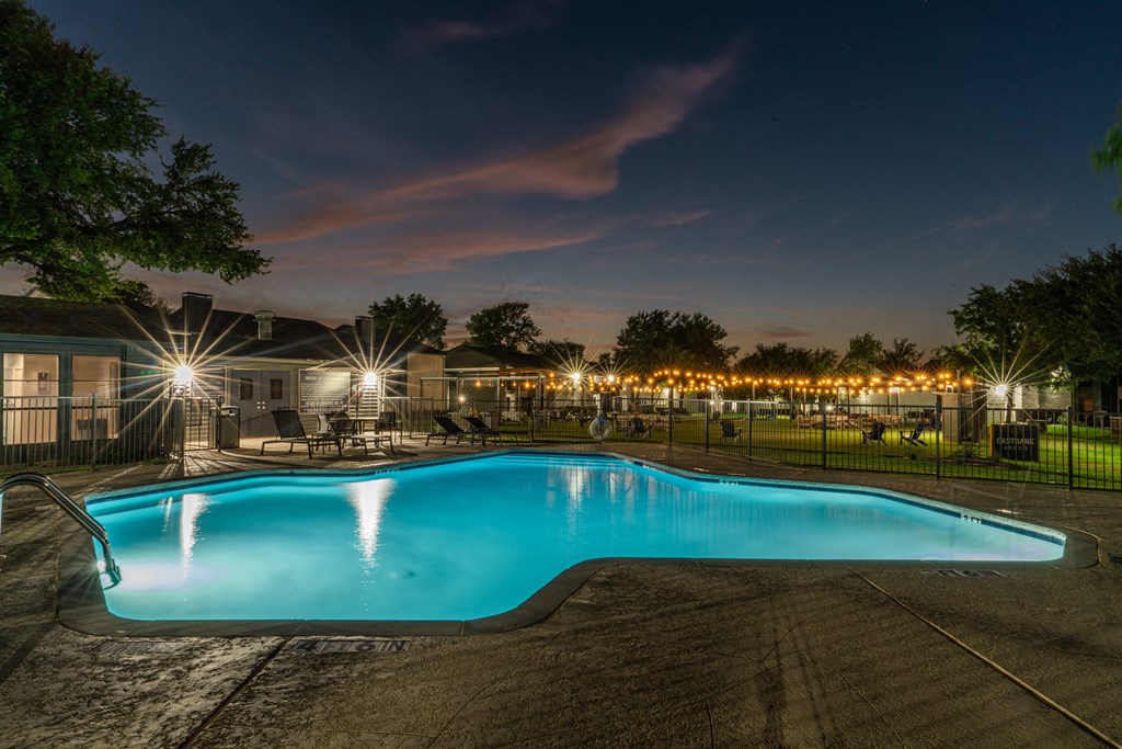 a swimming pool at night at night