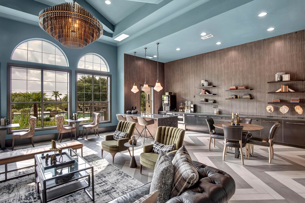 a living room filled with furniture and a large window