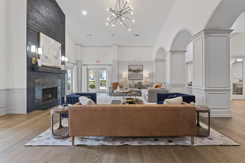 a living room with a couch and a fireplace