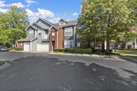 a large house with a street in front of it