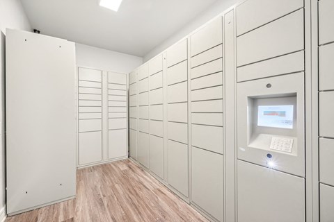a large white closet with a computer in it