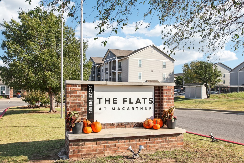 the flats entrance sign