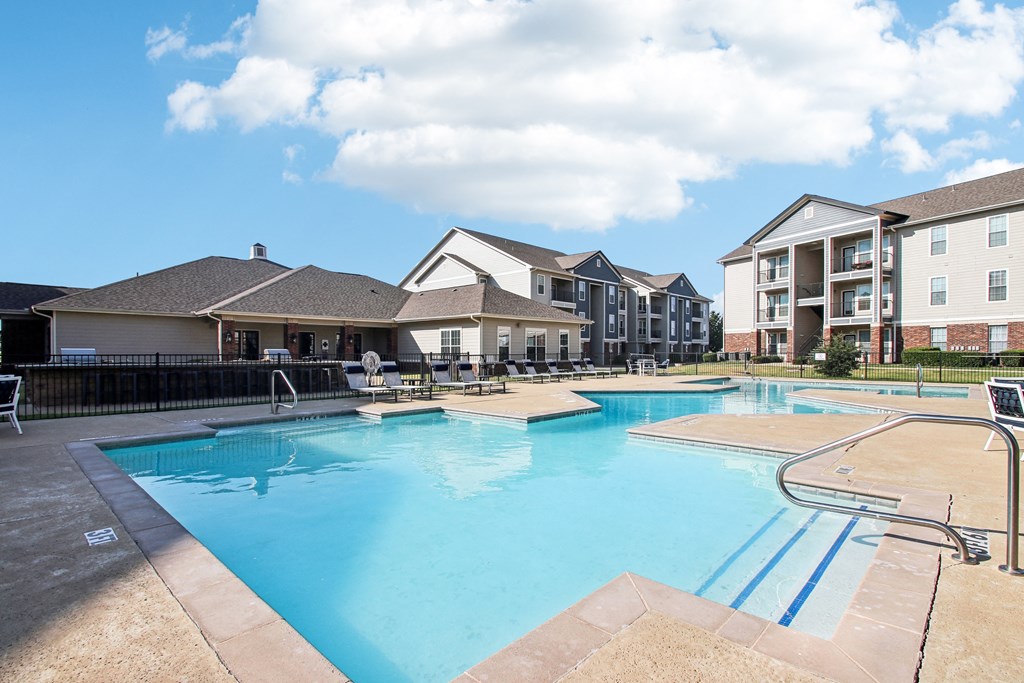 the residences at city center amenities amenities include a swimming pool and city apartment buildings