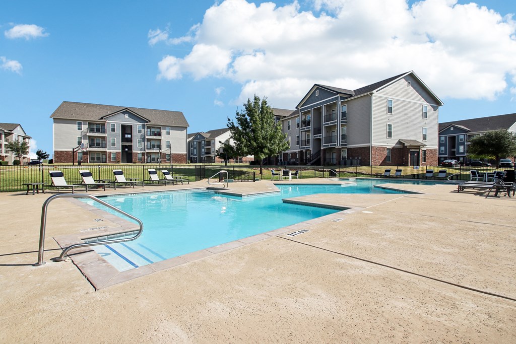 the preserve at ballantyne commons pool with apartment buildings