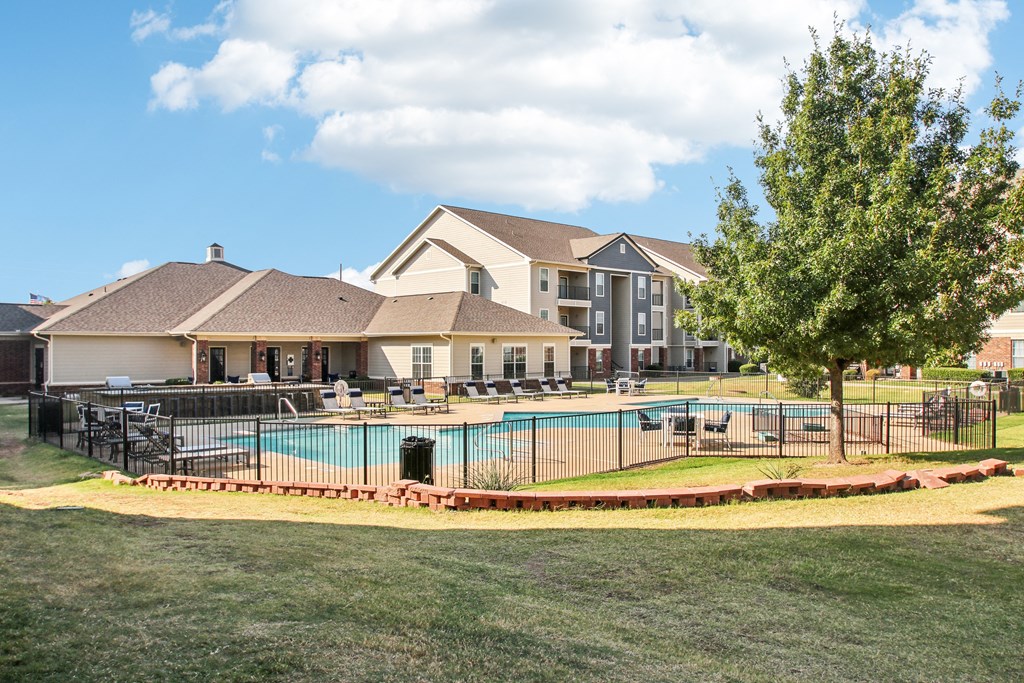 the preserve at ballantyne commons community swimming pool with apartments in the background