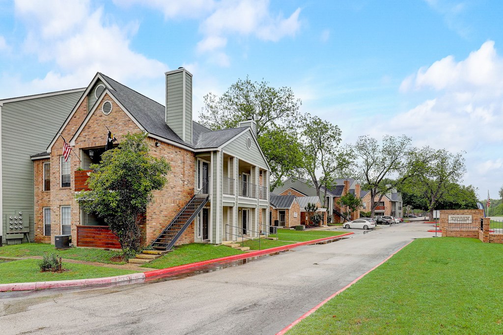 a row of houses on the side of a street