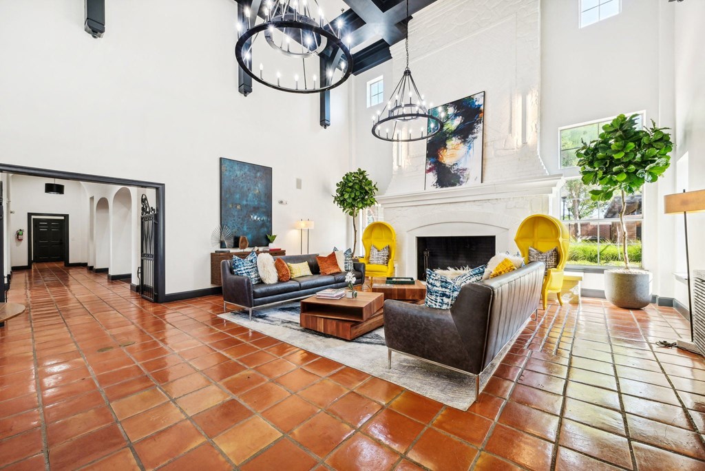 a living room with couches and a fireplace