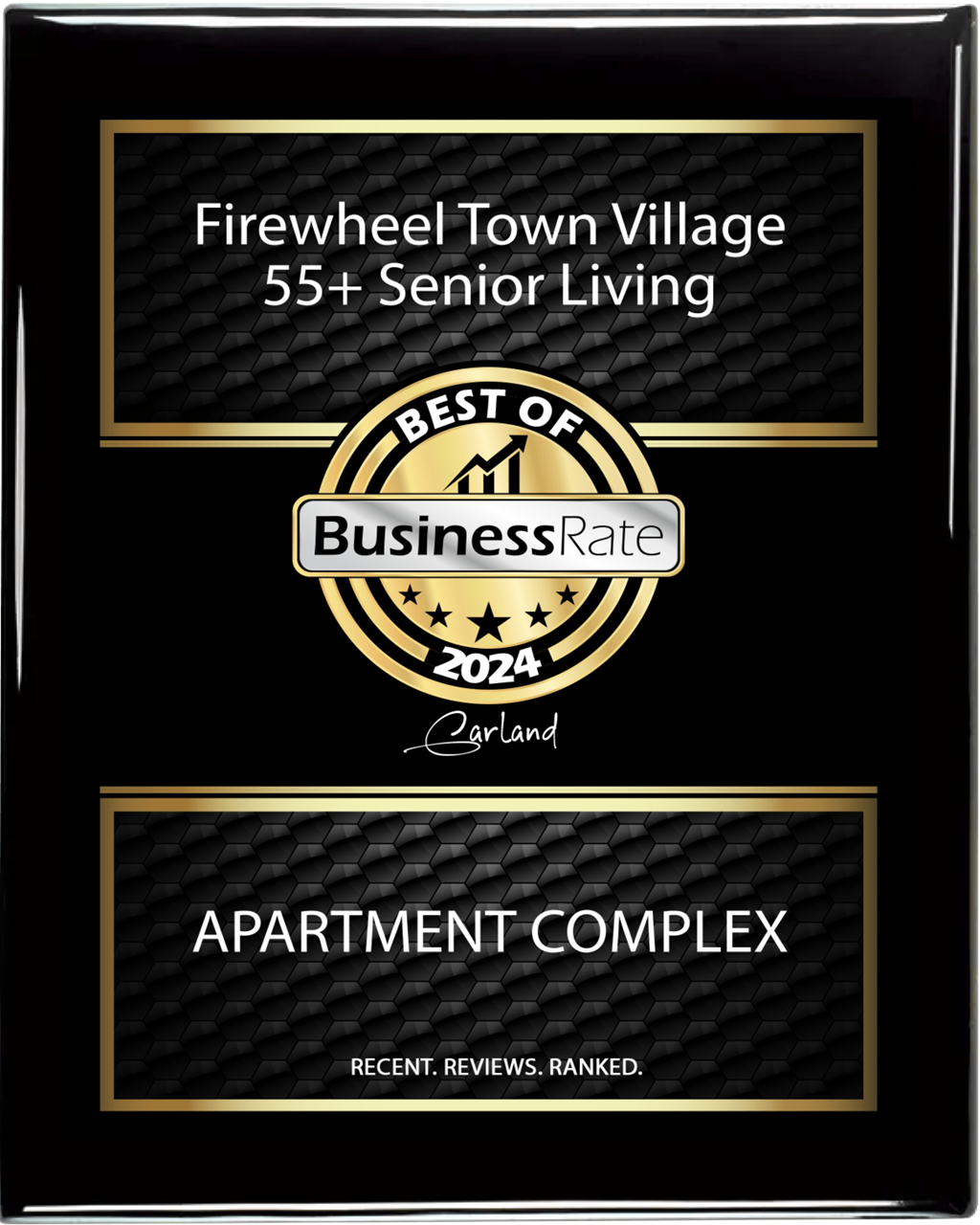A black and gold award plaque for Firewheel Town Village 55+ Senior Living.