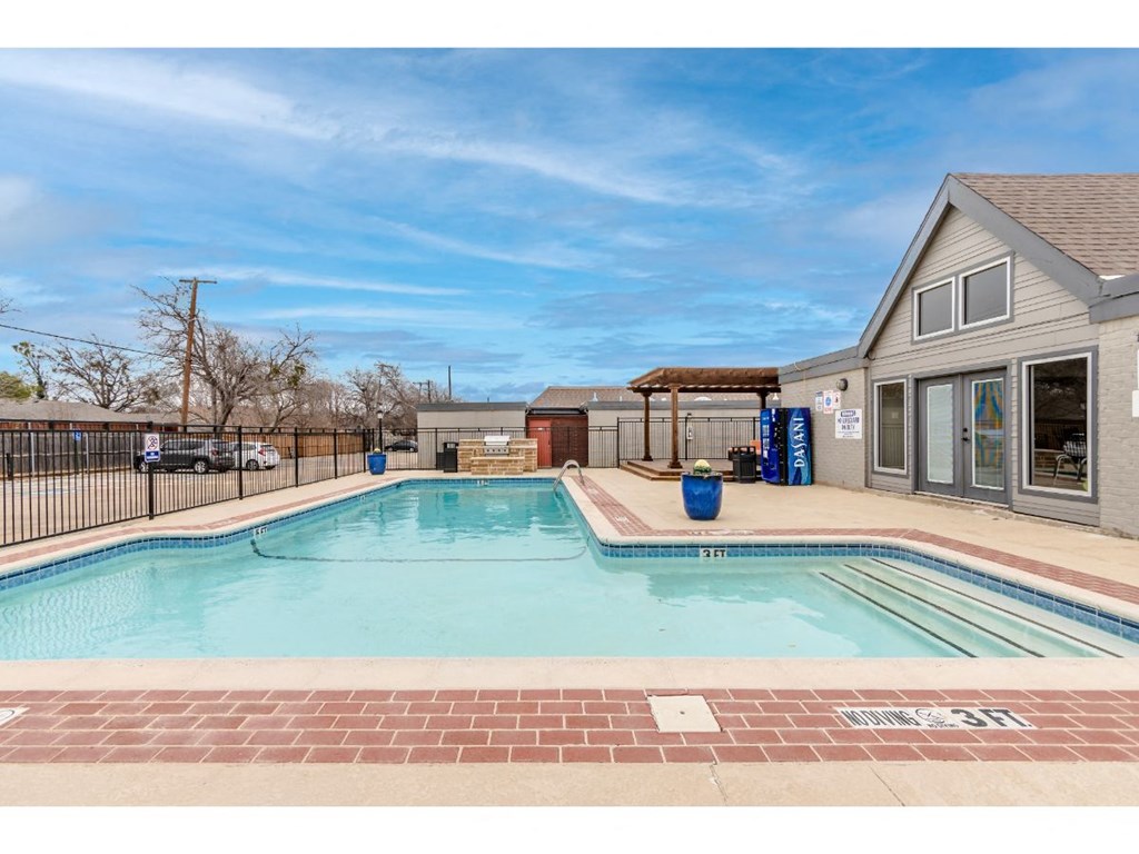 a swimming pool and a house with a pool