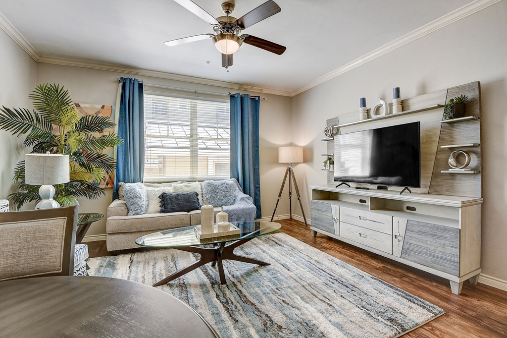 a living room with a couch and a tv