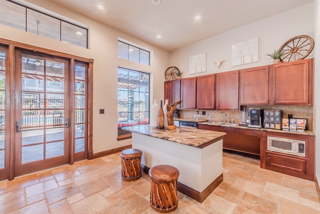 a kitchen with wooden cabinets and a counter top
