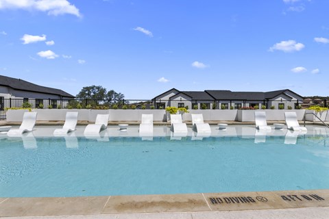 the swimming pool at the falls at rolland park apartments