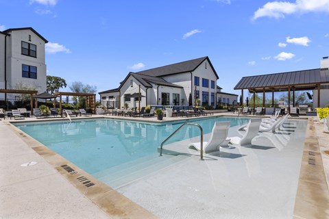 our apartments have a large resort style pool with lounge chairs