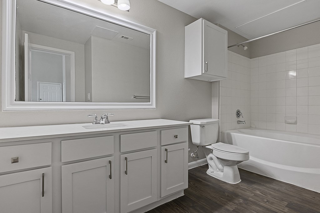 an image of a bathroom with a toilet and a sink